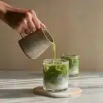 Best Iced Matcha Latte Recipe (Creamy, Refreshing & Easy!) 3 iced matcha latte recipe in a glass with almond milk and ice