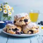 Blueberry Lemonade Scones – The Best 3-Ingredient Summer Treat 3 Blueberry lemonade scones cooling on a rack