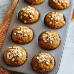 Healthy maple pumpkin muffins close-up with oats and spices