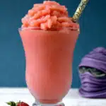 Ninja Creami slushie recipe with strawberries and pears in a glass