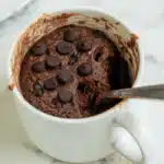 protein mug cake recipe in a mug, freshly baked chocolate version