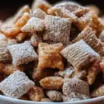 Caramel Apple Puppy Chow: The Addictive Fall Snack You’ll Crave All Season 3 Caramel Apple Puppy Chow snack mix in bowl with caramel and apple chips