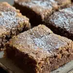 Gingerbread Brownies: The Ultimate Holiday Dessert You’ll Crave All Year 3 Gingerbread Brownies fresh from the oven on marble counter