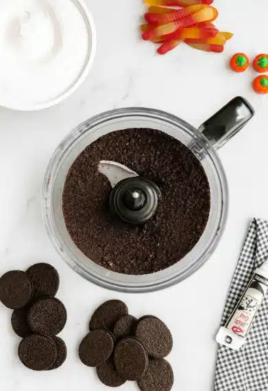 Crushed Oreo cookies for Halloween Dirt Cups base layer