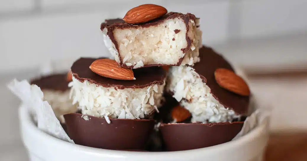 healthy almond joys on rustic plate