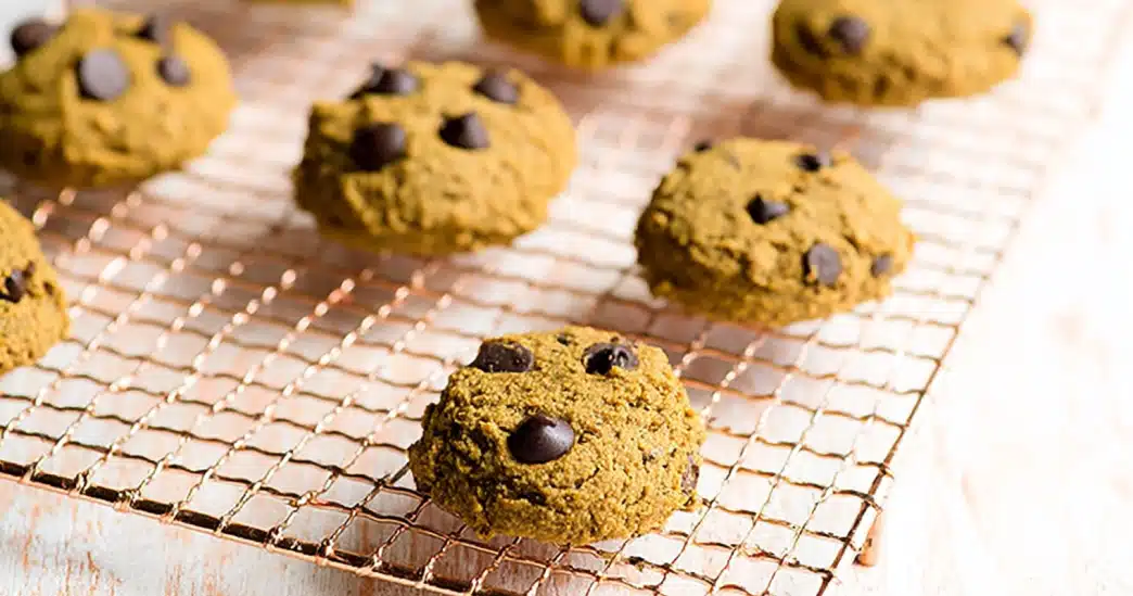Close-up of pumpkin chocolate chip cookies paleo gluten free on a cooling rack