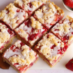 Strawberry Shortcake Bars: A Delicious Classic Made Simple and Perfect 7 Homemade strawberry shortcake bars with vanilla glaze and fresh strawberries