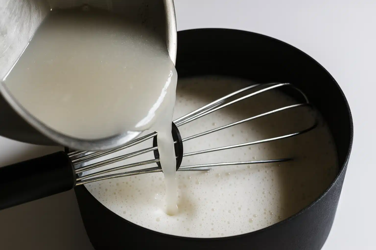 vanilla-agar-agar-pudding-recipe-milk-step-process vanilla agar agar pudding recipe milk step-by-step – pouring melted agar agar into hot milk