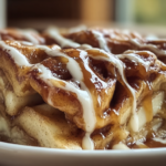 Cinnamon Roll Apple Lasagna fresh from oven with caramel drizzle